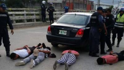 Los detenidos son Marco Tulio Acosta (21), José Neptaly Valle (24), José Pineda Hernández y Damy Rivera Enamorado (21).