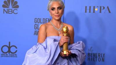 Lady Gaga posando en los Globos de Oro 2019. AFP