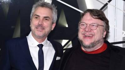 Los directores mexicanos, Alfonso Cuarón y Guillermo del Toro.