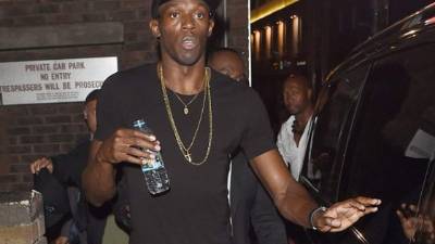 Usain Bolt la pasa a lo grande Inglaterra. Foto Daiy Mail.