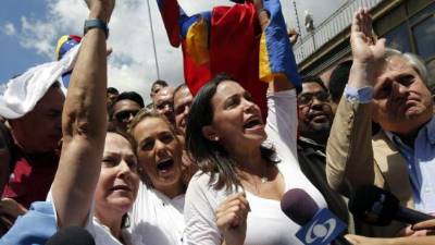 Mitzy de Ledezma y Lilian Tintori se han erigido en la oposición venezolana tras el arresto de sus esposos, las acompaña la exdiputada María Corina Machado.