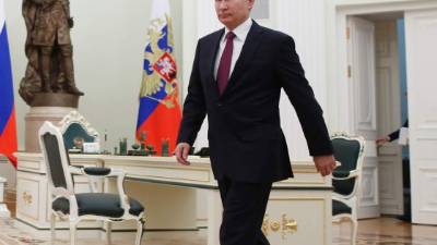 (FILES) In this file photo Russia's President Vladimir Putin attends a meeting with US President Donald Trump during the G20 summit in Osaka on June 28, 2019. - President Donald Trump said March 30, 2020 that he will shortly be talking with his Russian counterpart Vladimir Putin about plunging oil prices and the impact on US producers.'One of the subjects we're going to be talking about is energy,' Trump told Fox News in an interview. He said the phone call would be 'very soon.'The global market is experiencing a crude glut as a result of the ongoing price war between Saudi Arabia and Russia. In the United States, 'people in the oil and gas business are really hurting,' Trump said. (Photo by Brendan Smialowski / AFP)