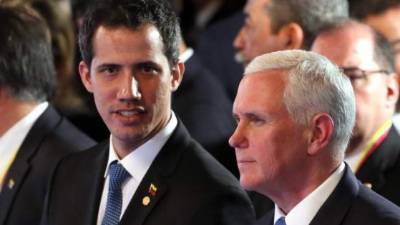 El presidente interino Juan Guaidó junto al vicepresidente de EEUU, Mike Pence. AFP/Archivo