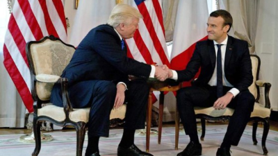 epa06689182 US President Donald J. Trump (L) and First Lady Melania Trump (C) with French President Emmanuel Macron (R) and his wife Brigitte Macron (obscured) during an arrival ceremony at the White House in Washington, DC, USA, 24 April 2018. President Macron will be in DC for three days for a state visit at the White House and an address to a joint session of Congress on 25 April. EPA/SHAWN THEW