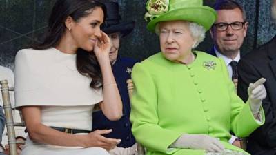 Meghan Markle y la reina Isabel II en una foto de archivo.