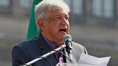Handout picture released by Mexico's Presidency showing Mexican President Andres Manuel Lopez Obrador gesturing during a press conference at the National Palace in Mexico City, on March 24, 2020 during the new coronavirus, COVID-19, pandemic. (Photo by - / Mexican Presidency / AFP) / RESTRICTED TO EDITORIAL USE - MANDATORY CREDIT 'AFP PHOTO / MEXICO'S PRESIDENCY' - NO MARKETING - NO ADVERTISING CAMPAIGNS - DISTRIBUTED AS A SERVICE TO CLIENTS