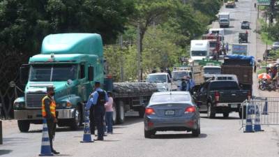 Los empresarios del transporte urbano de San Pedro Sula le dijeron a Diario LA PRENSA que los dos meses de inactividad los ha dejado inmersos en una crisis que difícilmente podrán superarla si no cuentan con el respaldo económico del Gobierno. Fotos La Prensa • Melvin Cubas, M. Valenzuela