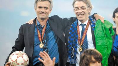 Inter Milan's Portuguese coach Jose Mourinho (L) and Inter Milan's president Massimo Moratti celebrate after winning the UEFA Champions League final football match Inter Milan against Bayern Munich at the Santiago Bernabeu stadium in Madrid on May 22, 2010. Inter Milan won the Champions League with a 2-0 victory over Bayern Munich in the final at the Santiago Bernabeu. Argentine striker Diego Milito scored both goals for Jose Mourinho's team who completed a treble of trophies this season. AFP PHOTO / CHRISTOPHE SIMON