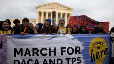 Demonstrators arrive in front of the US Supreme Court during the 'Home Is Here' March for Deferred Action for Childhood Arrivals (DACA), and Temporary Protected Status (TPS) on November 10, 2019 in Washington D.C. - They begun a march from New York City to Washington DC, to the US Supreme Court.The Supreme Court is set to hear oral arguments regarding termination of the Deferred Action for Childhood Arrivals (DACA) policy on November 12. (Photo by Jose Luis Magana / AFP)