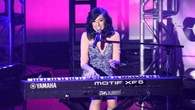 La cantante Christina Grimmie en uno de sus conciertos. Foto AFP.