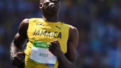 London (United Kingdom), 12/08/2017.- Jamaica's Usain Bolt reacts during the men's 4x100m Relay final at the London 2017 IAAF World Championships in London, Britain, 12 August 2017. (Londres, Relevos 4x100, Mundial de Atletismo, 100 metros, Estados Unidos) EFE/EPA/SEAN DEMPSEY