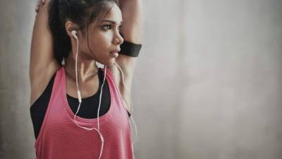 Shot of a sporty young woman preparing for a run