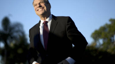 FILE - This Nov. 7, 2012 file photo shows San Diego Mayor Bob Filner smiling during a news conference at a park in San Diego. A prominent onetime supporter of Mayor Filner is calling for him to resign after less than a year in office amid allegations that he sexually harassed women. (AP Photo/ Gregory Bull, File)