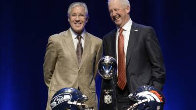 Pete Carroll, entrenador del Seattle Seahawks, junto a John Fox, ‘coach’ de los Broncos de Denver.