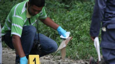 Los cadáveres tenían seis balazos en la cabeza.