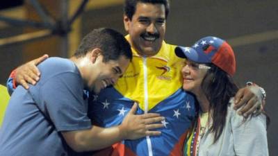 Nicolás Maduro, su esposa Cilia Flores y su hijo Nicolás.