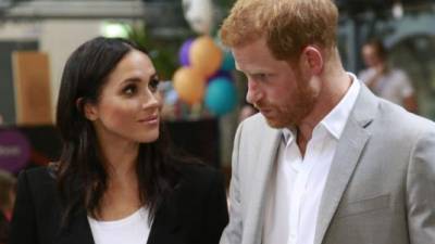 Britain's Prince Harry and wife Meghan, Duke and Duchess of Sussex visit the Dogpatch startup hub in Dublin on the final day of their trip on July 11, 2018. / AFP PHOTO / POOL AND it_freelance / Nick Bradshaw