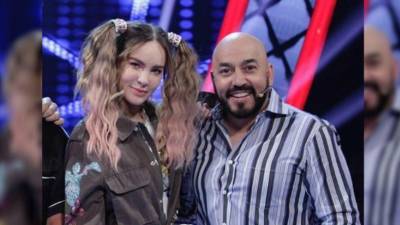 Los cantantes Lupillo Rivera y Belinda.