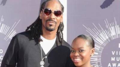 Snoop Dogg y su hija.