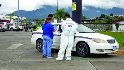 La Policía detuvo a dos jóvenes que habrían asesinado a la señora en el interior del taxi.