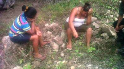 Yesenia Urrutia y María digna Guevara fueron detenidas en un campamento en la aldea Dos Bocas de Santa Rosa de Aguán.