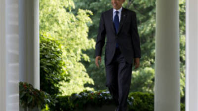 FILE - In this May 3, 2012, file photo, President Barack Obama walks from the Oval Office as he arrives to speak at a celebration of Cinco de Mayo in the Rose Garden of the White House in Washington. Despite a relentless workload ahead, President Barack Obama is lighter on his feet in one sense as he opens his second term. Gone are the hundreds of promises of the past. Hes toting carry-ons instead of heavy cargo this time. Failing to achieve a promised first-term overhaul of immigration law, Obama took stopgap executive action to help as many as 1.7 million younger illegal immigrants stay in the country, and now, after an election marked by Hispanic clout, finds the political landscape more amenable to trying again. (AP Photo/Carolyn Kaster, File)
