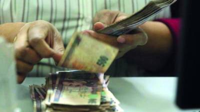 La estabilidad en la TPM se ha reflejado en las bajas tasas de interés para préstamos en lempirasy en dólares que coloca el sistema financiero de Honduras.