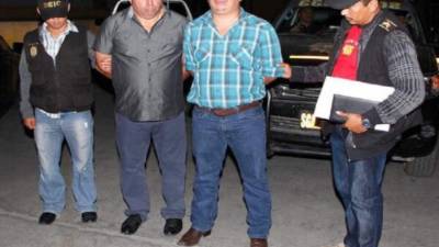 El mexicano Gregorio Ramírez Coria y el hondureño Francisco Inestroza García al momento de su captura.