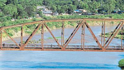 Una imagen del río Chamelecón, donde caen la mayoría de aguas residuales de la ciudad.