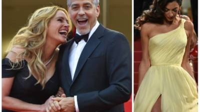 Julia Roberts pisó hoy por primera vez la alfombra roja de Cannes y lo hizo con su habitual enorme sonrisa, que iluminó el desfile previo al estreno de 'Money Monster', película dirigida por Jodie Foster y con George Clooney, que acudió junto a su esposa, Amal Clooney.