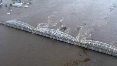 This aerial photo released by the U.S. Coast Guard shows the tidal surge and flooding from Hurricane Gustav around the bridge across the Rigolets in eastern New Orleans La., Monday, Sept. 1, 2008. The Rigolets is one of two passes that connect Lake Pontchartrain with the Gulf of Mexico and a key conduit of storm surge into the New Orleans area. (AP Photo/U.S. Coast Guard)