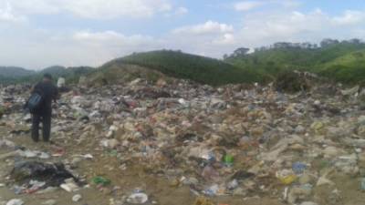 El cuerpo de la víctimas estaba en un costal y fue encontrado por pepenadores en el crematorio de San Pedro Sula.