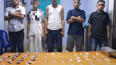 Los detenidos cuando eran presentados ante las autoridades.