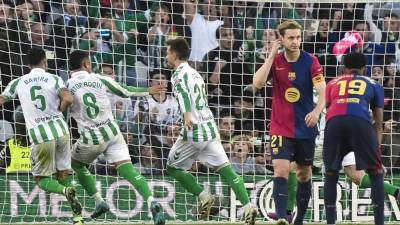 Giovani Lo Celso celebrando su gol contra el Barcelona.