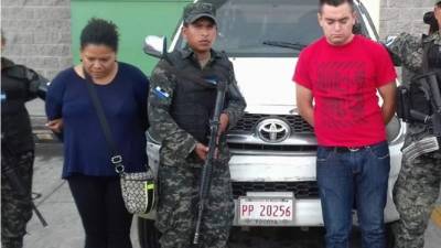 Los detenidos cuando eran presentados ante las autoridades.