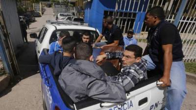 Hondureños eran trasladados hacia la DPI. Foto de archivo.