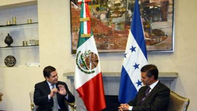 El presidente de Honduras, Juan Orlando Hernández, recibe hoy en Comayagua a su homólogo de México, Enrique Peña Nieto. Foto: Reforma.