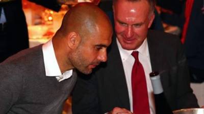 Rummenigge junto a Pep Guardiola.