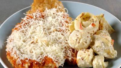 Acompañar la milanesa con ensalada de palmitos.