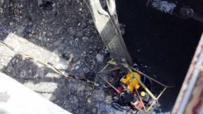 Ratas, heces y preservativos rodean a Julio César Cu, un buzo de aguas negras que se sumerge en el drenaje de la Ciudad de México desde hace treinta años.