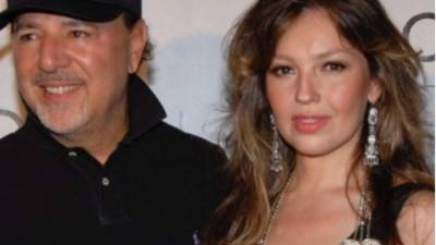 Tommy Mottola y Thalía