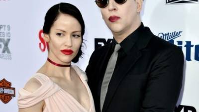 La fotógrafa Lindsay Usich y el cantante Marilyn Manson.