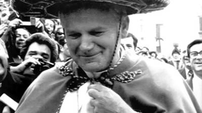 FILE - In this April 11, 1979 file photo, Pope John Paul II wears a typical Sombrero 'Charro' he was given by a member of the band from Monterrey, Mexico's Boy's Town, which performed for the Pontiff in St. Peter's Square during general audience. Pope John Paul II will be beatified May 1, 2011 during a ceremony at San Peter square in Vatican City. (AP Photo, file)