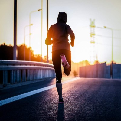 run runner sport shoe road jogging flare sunset street fitness cross sunbeam success running sportswear - stock image