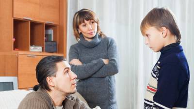 Parents berating teenager son in home