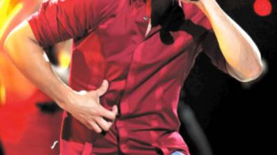 Puerto Rican singer Chayanne performs during the fourth night of the Vina del Mar International Song Festival in Vina del Mar, Chile, Thursday Feb. 24, 2011. Believed to be one of the largest musical events in Latin America, the annual five-day festival was inaugurated in 1960. (AP Photo/Jorge Sanchez)