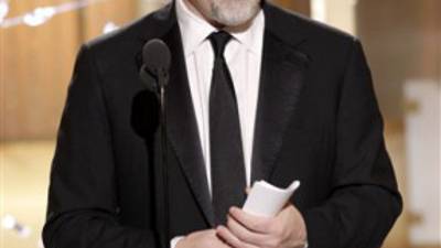 In this publicity image released by NBC, David Fincher accepts the award for Best Director in a Motion Picture for 'The Social Network' during the Golden Globe Awards, Sunday, Jan. 16, 2011 in Beverly Hills, Calif. (AP Photo/NBC, Paul Drinkwater)