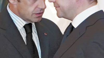 Russian President Dmitry Medvedev, right, and French President Nicholas Sarkozy seen at a joint news conference in the Kremlin in Moscow on Tuesday, Aug. 12, 2008. The Russian and French leaders negotiated conditions Tuesday for ending fighting in Georgia, agreeing on a plan that calls for both Russian and Georgian troops to move back to their original positions. (AP Photo/RIA-Novosti, Mikhail Klimentyev, Presidential Press Service)