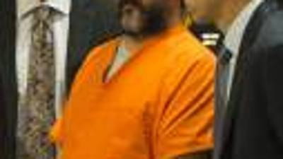 CLEVELAND, OH - AUGUST 1: Ariel Castro (3L) listens as Judge Michael Russo reads his sentence on August 1, 2013 in Cleveland, Ohio. Castro was sentenced to life without parole plus one thousand years for abducting three women between 2002 and 2004 when they were between 14 and 21 years old. The women escaped this past May. Angelo Merendino/Getty Images/AFP== FOR NEWSPAPERS, INTERNET, TELCOS & TELEVISION USE ONLY ==