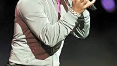 Puerto Rico's Tito el Bambino performs during the 51th Vina del Mar International Song Festival in Vina del Mar, Chile, Thursday, Feb. 25, 2010. (AP Photo/Jorge Sanchez)